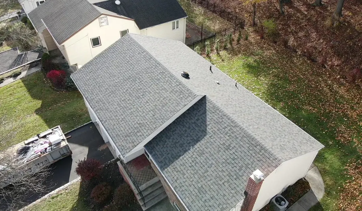 An architectural asphalt shingle roof on a northern New Jersey home, installed with proper ventilation and flashing