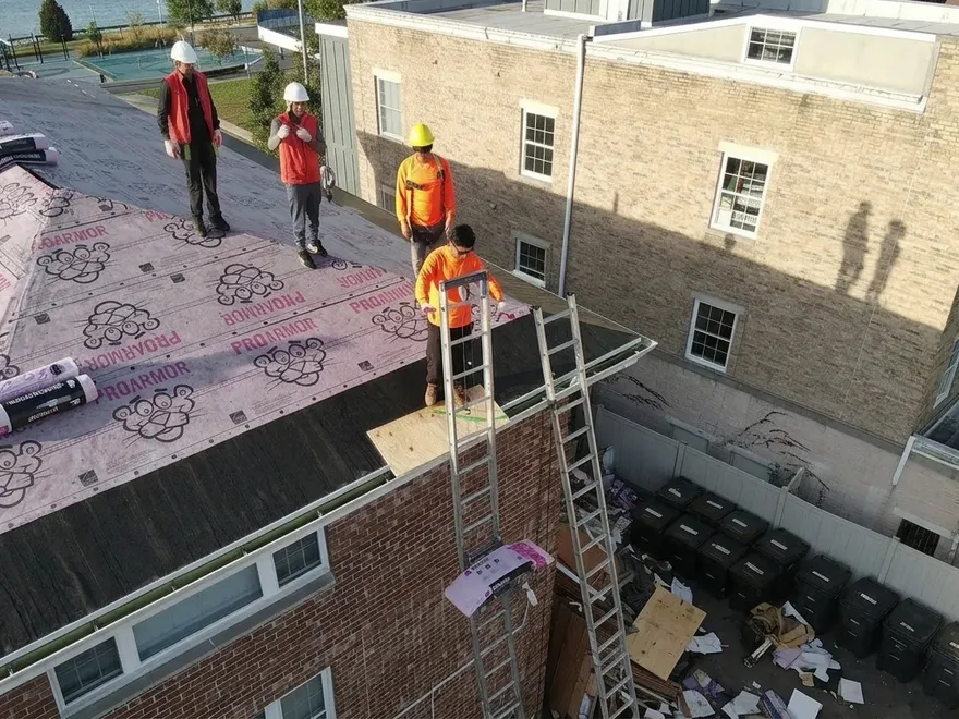 Englewood Roof Repair crew finishing a roof
